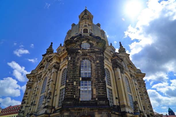 istock Frauenkirche Dresden with blue sky, backlit by sun 1028518770