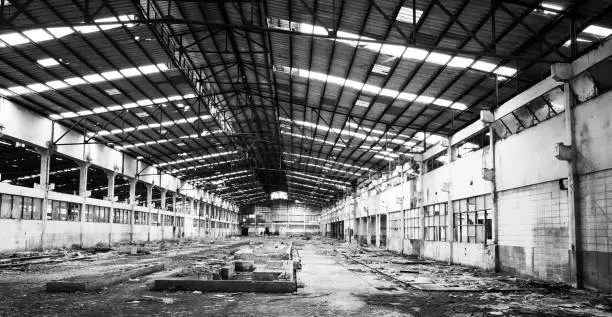 black and white deserted factory after bankruptcy