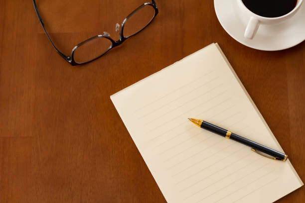 istock Image of writing a letter Letter Pen Coffee 1028552760