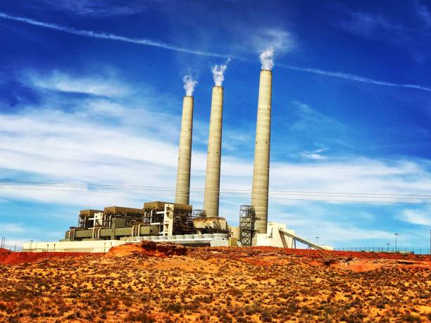 smoke stacks on blue sky