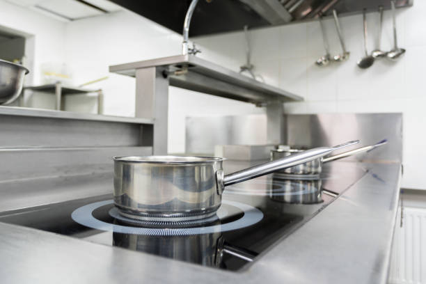 istock Stove counter in a modern restaurant kitchen 1028599286