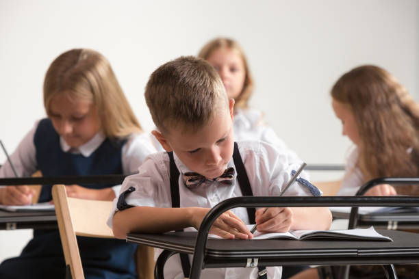 istock School children in classroom at lesson 1028606118