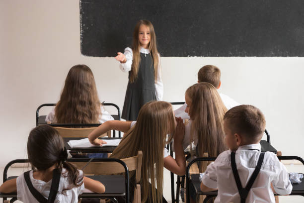 istock School children in classroom at lesson 1028606348