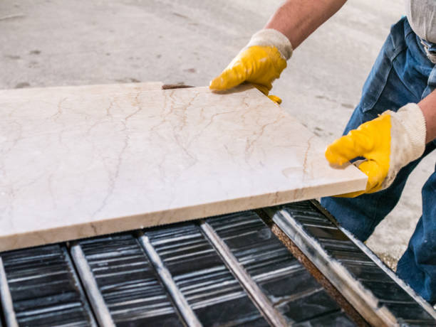 istock Worker is holding marble  in marble factory 1028613770