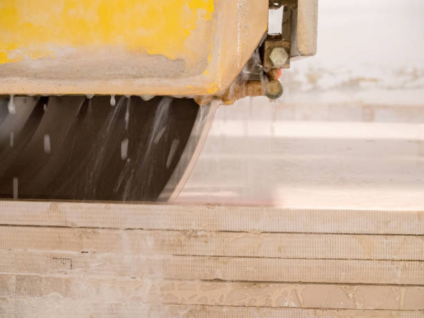 istock Chainsaw chain cutting marble in marble factory 1028613802