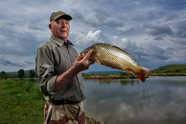 istock senior man at fishing 1028616312