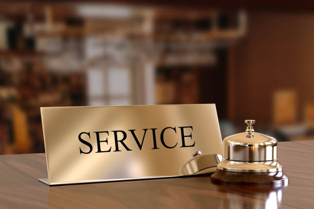 service bell on hotel reception desk - hotel concierge service service bell imagens e fotografias de stock