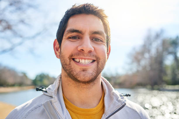 Portrait of a handsome young man spending some time outdoors
