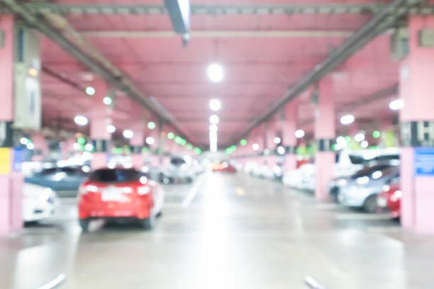 istock Abstract blur car parking lot for background 1028631602