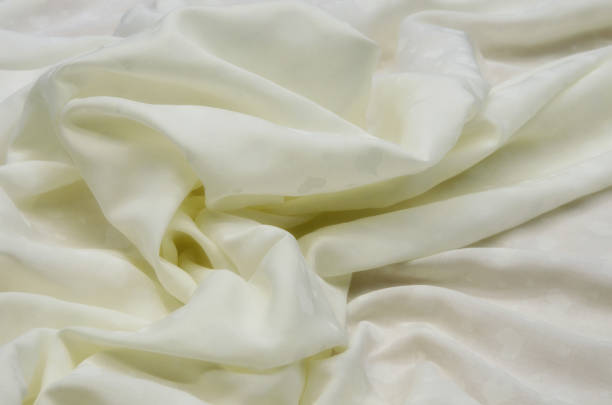 istock Cotton fabric with viscose milk color 1028647626