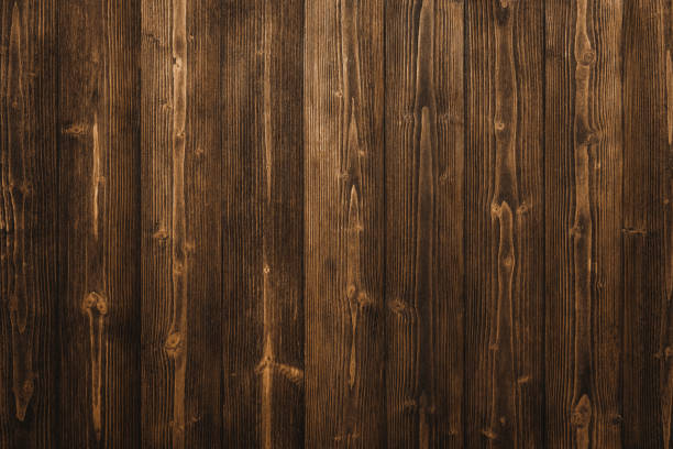 istock Dark brown wood texture with natural striped pattern background 1028651016