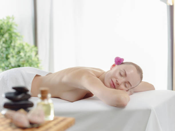 istock Young woman at the spa 1028655176