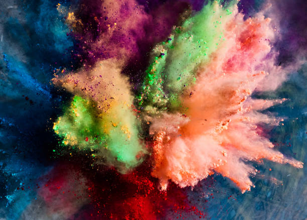 istock Holi powder splashing in the air. 1028657882