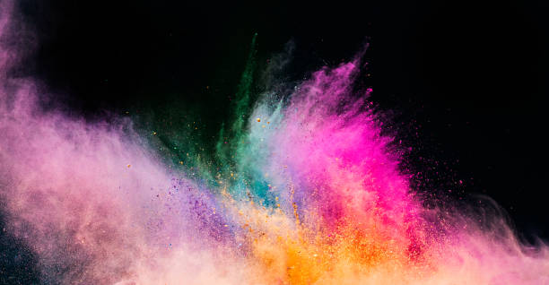istock Holi powder blowing up on black background. 1028657888