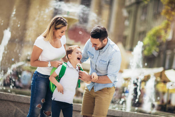istock Young parents taking their little child to school 1028662672
