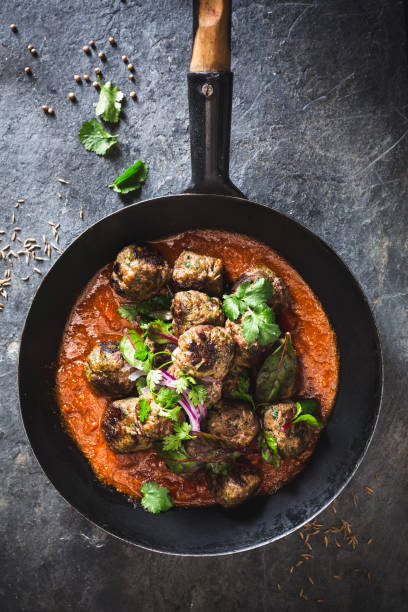 istock Indian meatball and Curry sauce 1028669260