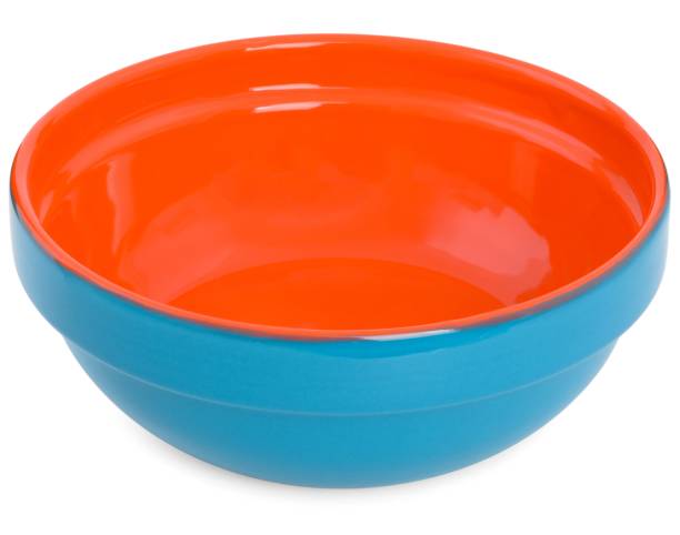 istock Blue clay plate isolated on a white background / ceramic dishes 1028673274