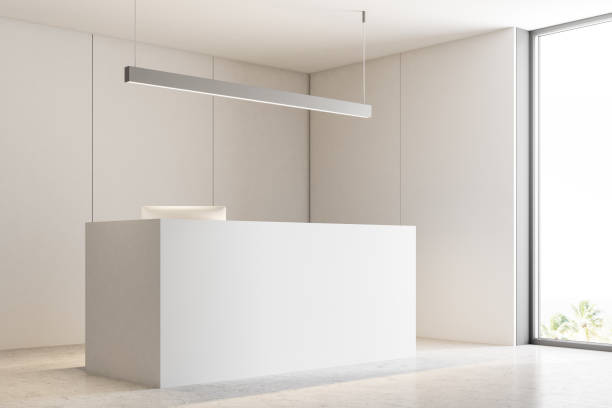 istock White reception counter in beige office corner 1028676464