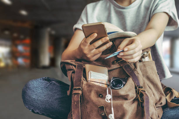 Hand holding credit card with hand for payment online shopping. Hand holding credit card with hand for payment online shopping. Concept of travel. discover card stock pictures, royalty-free photos & images