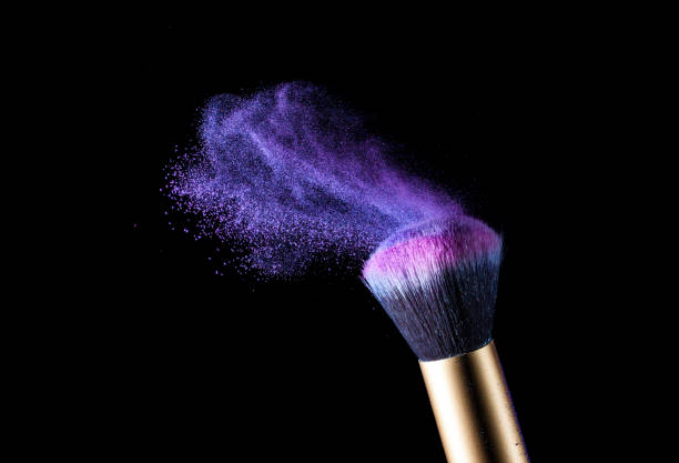 istock Makeup Brush. Powder explosion. Isolation on a black background. 1028679876
