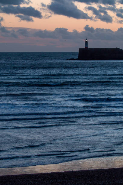 istock Lighthouse at End of Day 1028690286