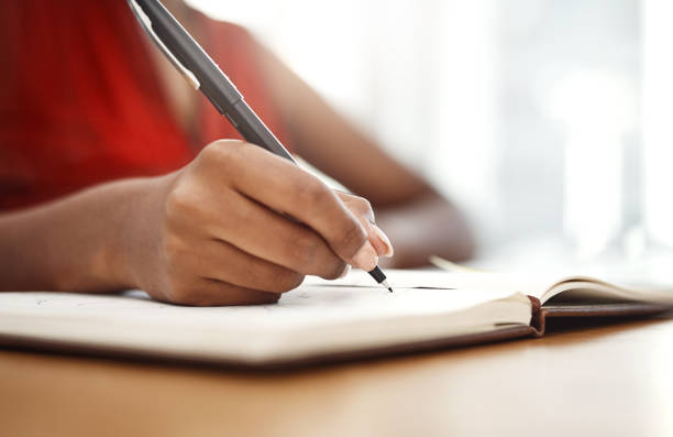 istock Jotting down ideas for her business as they come 1028690862