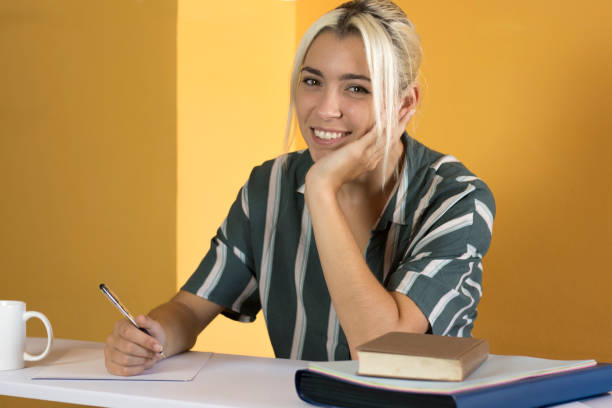 istock Satisfied employee looking at camera in the office 1028691306