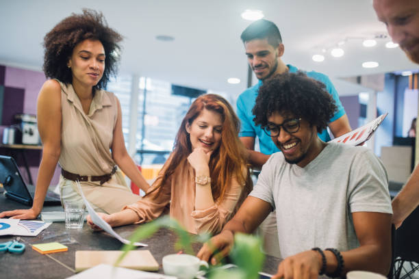 istock Group of young business people working in an office 1028706164