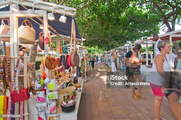 Vendors And Visitors At The Sunset Market In Puerto Portals Stock Photo - Download Image Now