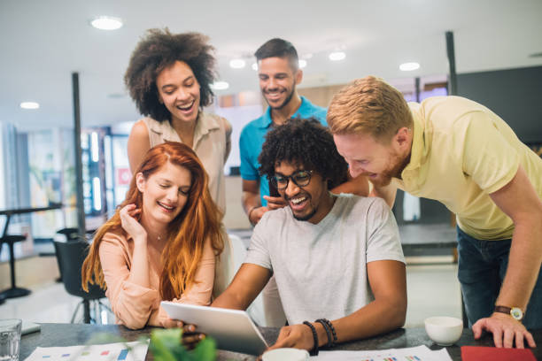 istock Young people doing business in an office 1028706764