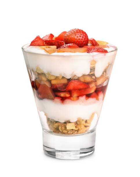 Glass of fruit and yogurt parfait Glass of fruit and yogurt parfait isolated on white parfait photos stock pictures, royalty-free photos & images