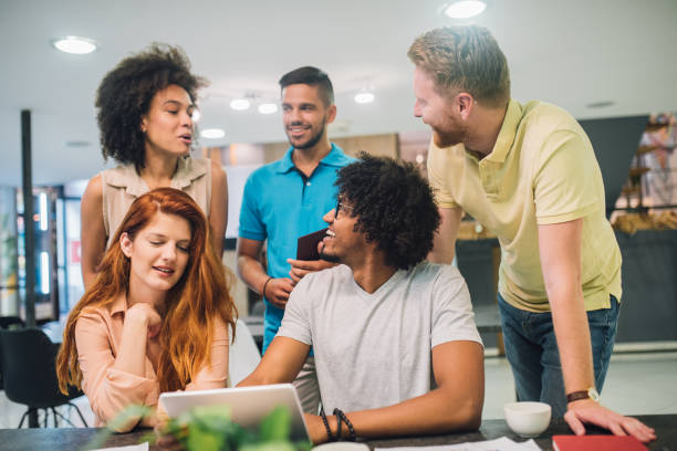 istock Casual young people doing business in an office 1028706900
