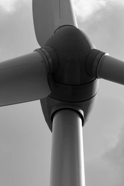 istock Industrial wind turbine on the gray sky background 1028722964