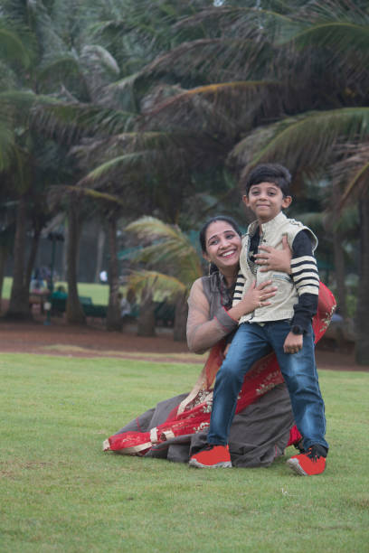 istock Mother and son enjoying at park 1028723066