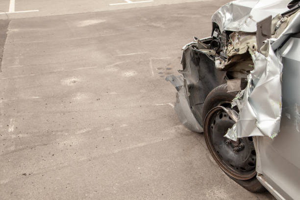 istock Crash car in front after the accident. Broken wing and wheel, bumper and undercarriage 1028733430