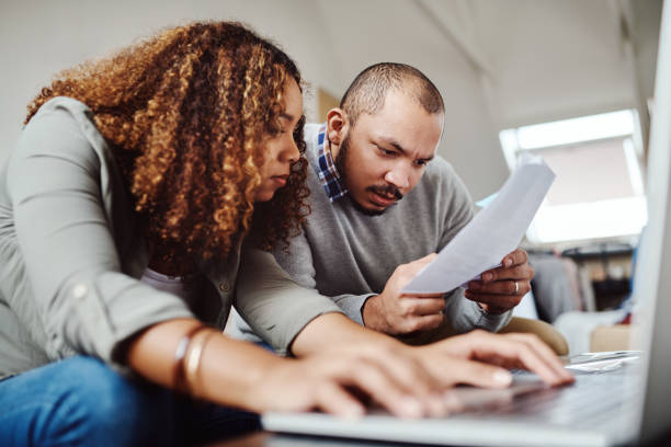 istock Scrutinizing every detail of their budget 1028735984