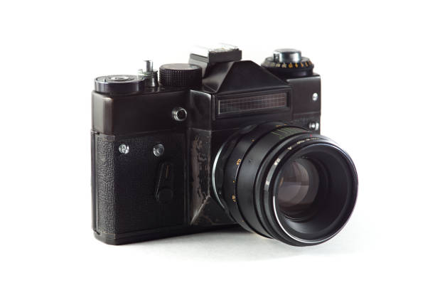 istock Retro vintage film camera on white background 1028739868