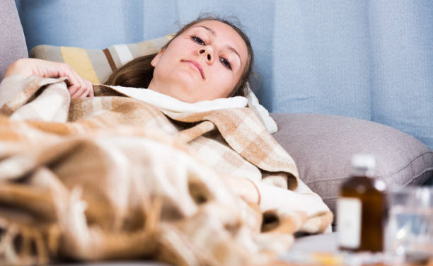 istock Woman being ill 1028740660