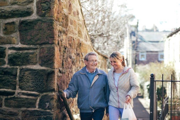 istock Walking Home from Shopping with his Carer 1028757550