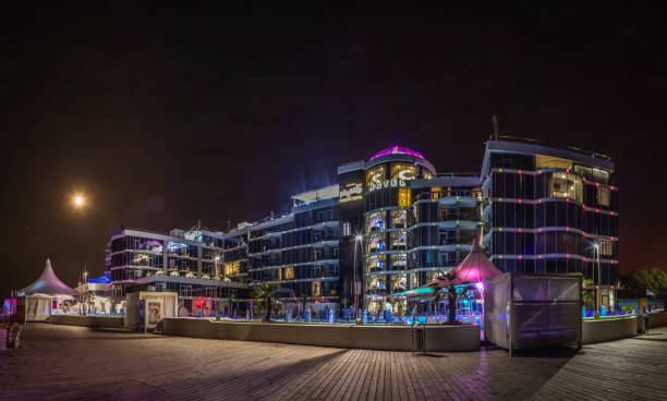 Langeron beach in Odessa at night Odessa, Ukraine - 08.22.2018. Panoramic view of Langeron city beach in a hot summer night. The most popular beach in Odessa odessa beach stock pictures, royalty-free photos & images