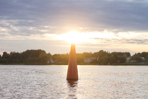 istock buoy like a lighthouse in the water 1028766028