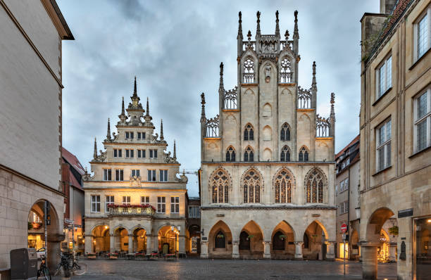 Town Hall of Münster in Germany Gable of the city wine house and townhall at Prinzipalmarkt, Muenster, Muensterland, North Rhine-Westphalia, Germany munster stock pictures, royalty-free photos & images