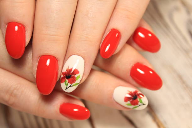 istock Manicured nails colored with red nail polish 1028766776