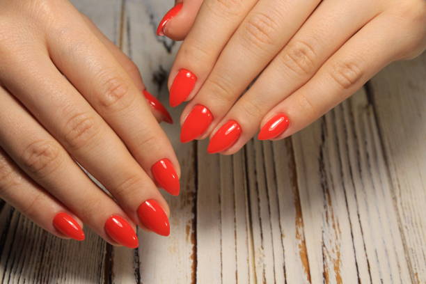 istock glamorous beautiful manicure on a trendy texture background 1028766818