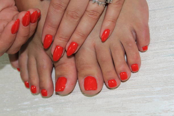 istock Stylish manicure nails color black and silver 1028766944