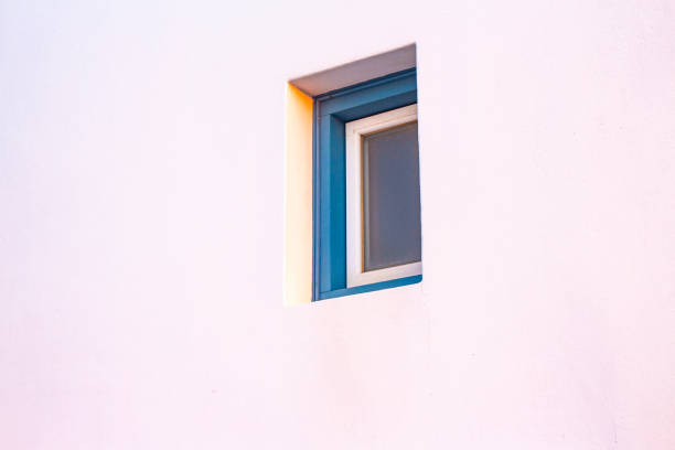 istock Wooden window in a white wall . Minimalist. 1028767442