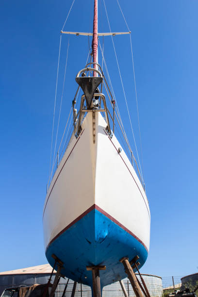 istock Sailboat in a shipyard waiting to be repared 1028769600