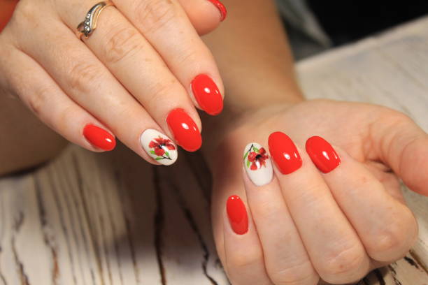 istock Stylish manicure nails color black and silver 1028772412