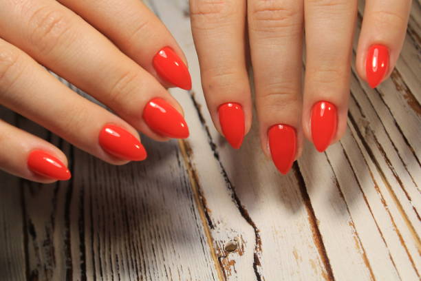 istock Stylish manicure nails color black and silver 1028772646