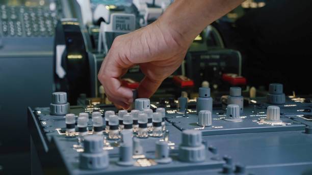 istock Panel of switches on an aircraft flight deck. Pilot controls the aircraft. 1028772780